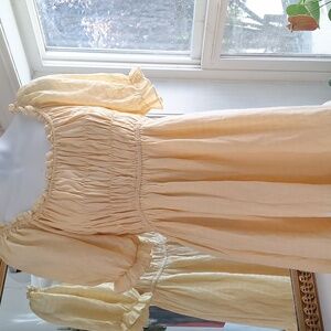 Urban Outfitters ruffle yellow cupcake dress size LG